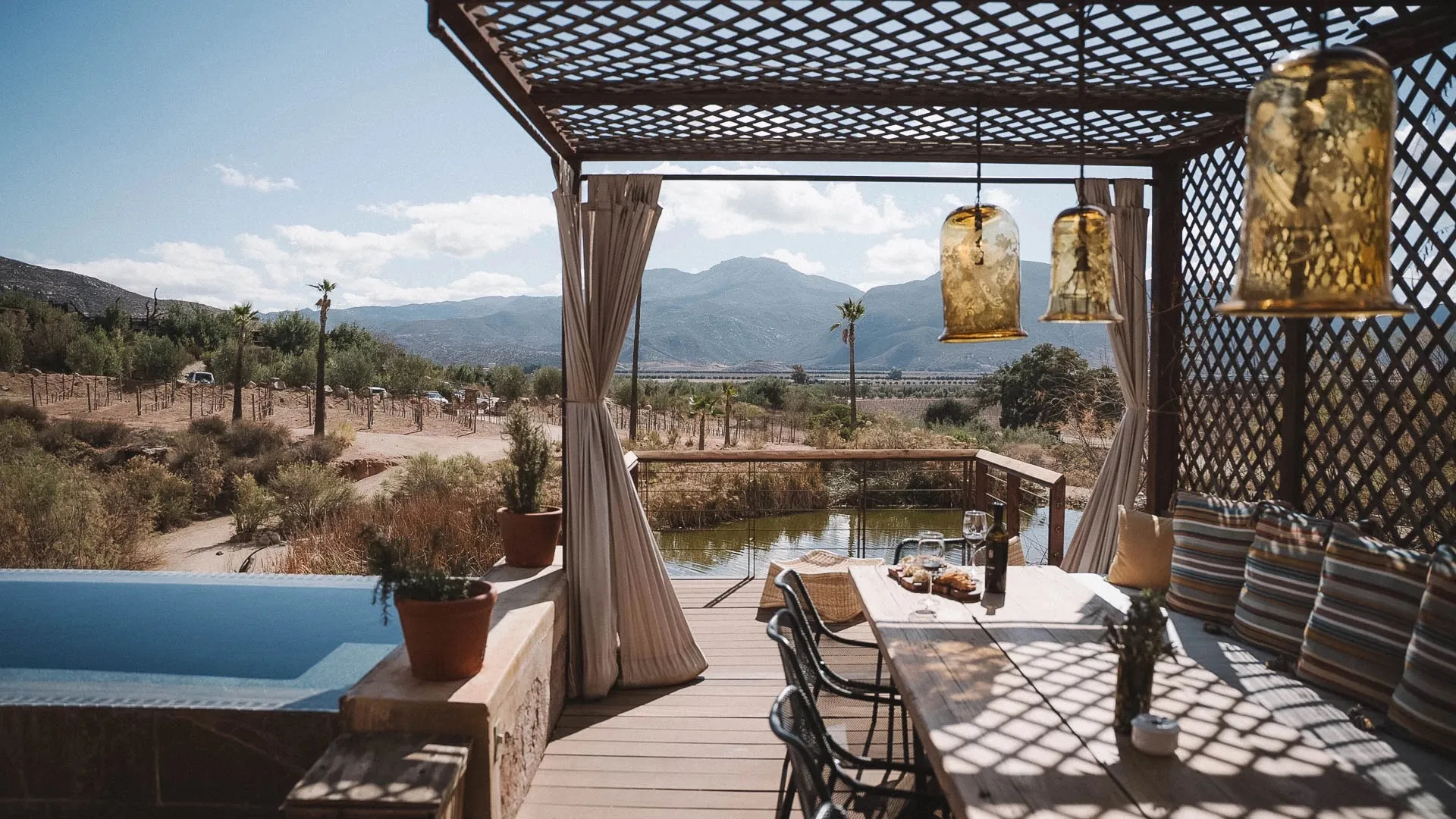 A shaded deck and plunge pool at Casa Montaña
